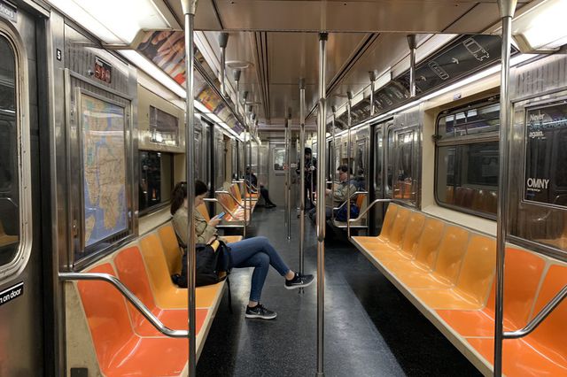 A nearly empty 1 train at rush hour on Tuesday night.